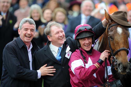 Michael O'Leary, Charles Byrnes & Davy Russell with Weapon's Amnesty after he won the RSA Chase in 2010