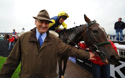 Noel Meade pictured with Muirhead after winning the 2011 Ladbrokes Munster National 