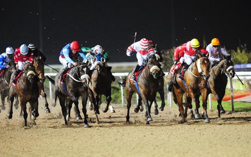 If Per Chance (red cap towards left) are about to win at Dundalk