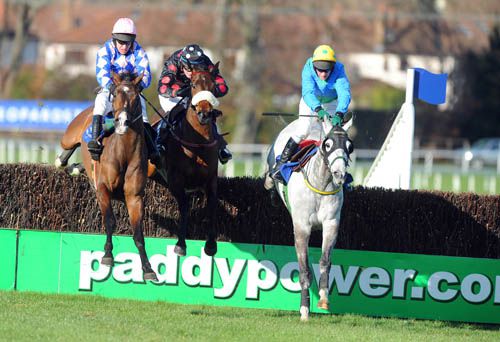 Slieveardagh and Barry Geraghty (left) jump the last fence with Donnas Palm (right) and  Imperial Shabra