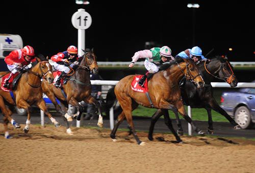 Prince Of Fashion (nearside) battles it out with Rodriguez up front before going on to win