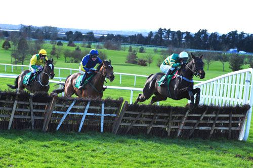 Competitive Edge, right, jumps the last to score at Navan  