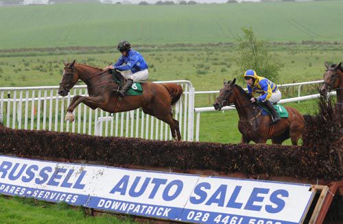 Shabra Charity and Matthew Bowes put in a <br>huge leap at an early fence