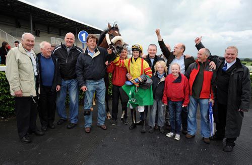 The Total Recall Racing Club celebrate with Beau Michael and Ado McGuinness
