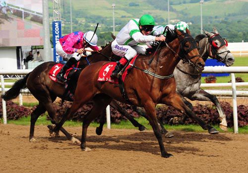 Ferryview Place, green cap, swoops to conquer at Dundalk