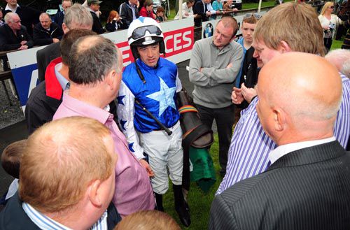 Ruby Walsh talks to members of the Supreme Horse Racing Club after the success of Zuzka