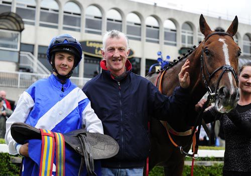 Jockey Joe Doyle celebrates his first win with his dad Jim and Inis Meain 