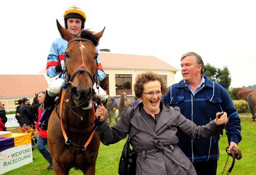 Winning owner Alice Cummins leads in Aughnacurraveel who is trained by her husband Thomas