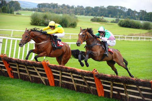 Defence Of Duress, right, comes to tackle Ring Ben at Gowran Park