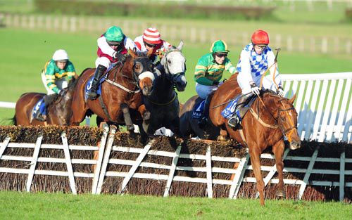 Acriveen, red cap, boxes on to win at Naas under Adam O'Neill