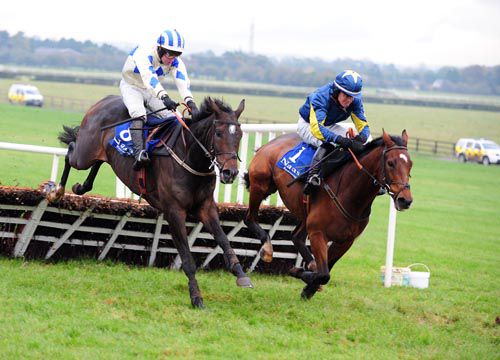 Worldor, left, hits the front after the last at Naas