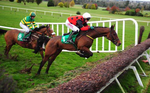 Dylan Ross jumps a fence on his way to victory under Paul Carberry