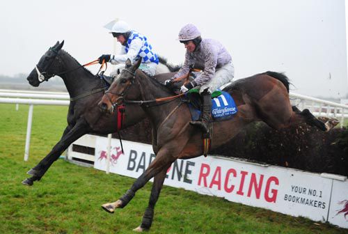 Give Us A Hand and Murchu (nearside) are locked in combat at Fairyhouse
