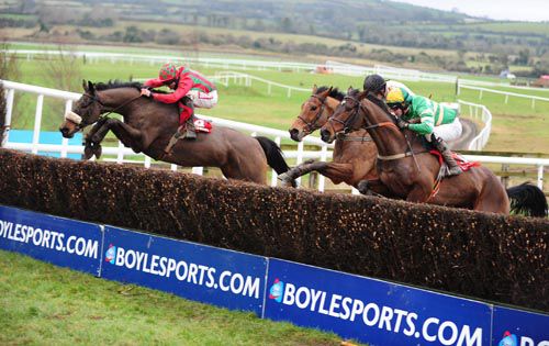 Lastoftheleaders (left) and Davy Russell lead over the last