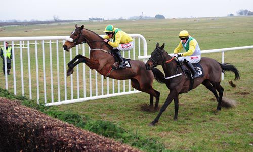 Carrig Millie produces a terrific leap at the last