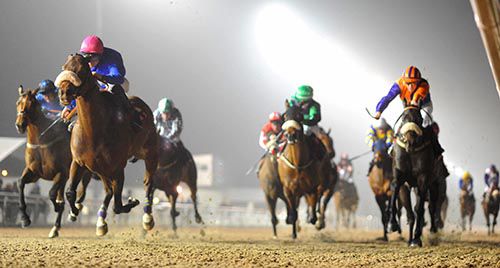 Esytopolishadimond (pink cap) comes home in front at Dundalk