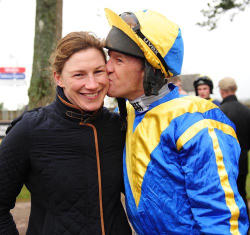 Paul Carberry gives his sister Nina a kiss for good luck before taking the ride on Barneys Honour (3rd)