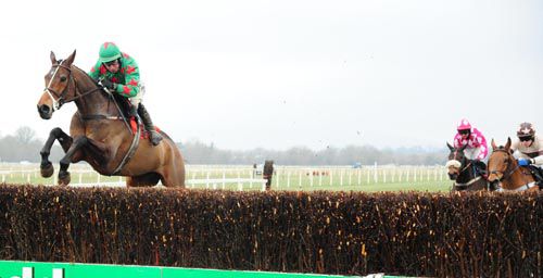 A Fine Young Man (Mark Enright) clears the last in the beginners chase