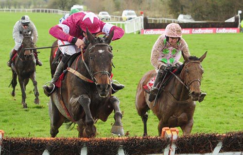 Rye Martini jumps the last well, ahead of Marito at Punchestown