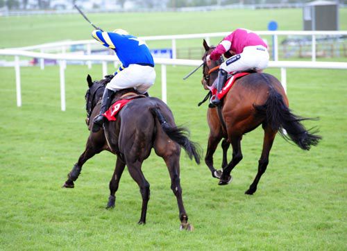 Daring Article (nearside) comes to 'do' Stonemaster at Punchestown