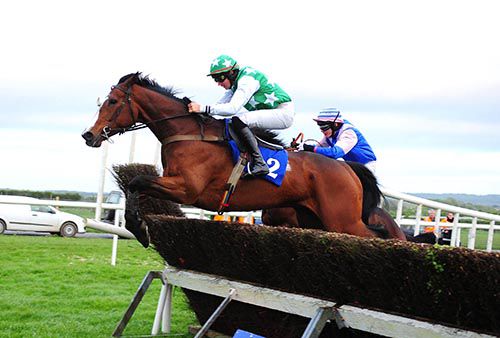 Clar Na Mionn clears the last at Roscommon from Abou Ben