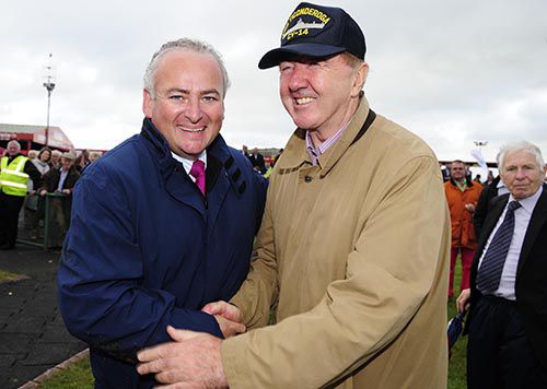 A delighted Brian Gleeson and Dermot Weld after their Dont Tell No One won the bumper