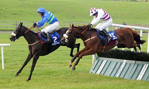 Derrylea Girl clears the last from Stay In My Heart in the first on Ladies Day at Tramore