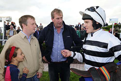 Eoin Doyle with daughter Katie, Paul Holden and Jody McGarvey after Alf Wright's win