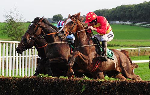 Rattan, red, and Ruby Walsh on their way to victory in Downpatrick