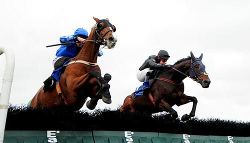 Alajan (nearside) is tackled by Sir Loujay (eventual winner) at the last