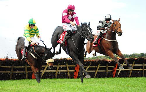 Art Of Payroll, right, comes through to win in Cork