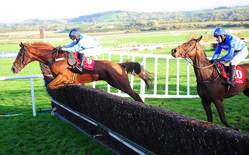 Keep On Track jumps the last from Bendala Bleu at Punchestown