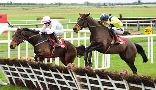The Tullow Tank (right) jumps the last at Fairyhouse last time