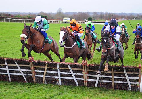 Hop In (left) challenges over the last with Balnagon Boy (centre) and Blacklough (right) 