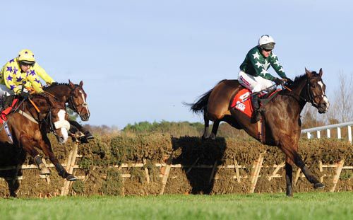 Dysios, right, holds the lead ahead of Leah Claire in Leopardstown