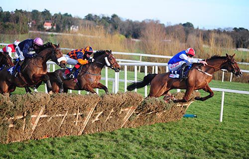 Sea Light (Davy Russell) jumps the last in front