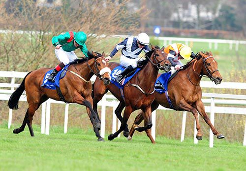 Ceisteach, right, wins a three-way photo in Leopardstown
