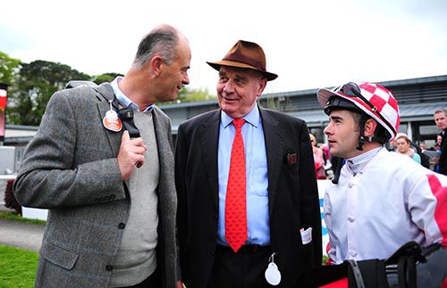 Eddie Lynam, David Power (husband of owner Sabina) and Fergal Lynch chat after the victory of Gathering Power