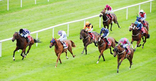 Tom Dooley (nearside) comes late and fast under Declan McDonogh at Gowran