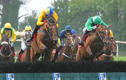 Cacheofgold (Jonathan Burke, green, winner) does battle with Supreme Vic (left, the eventual 2nd)