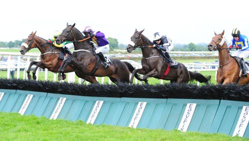 Swiftmarc (Ian McCarthy) just leads War Of the Pennys (left), Swantykay and Curragh Golan (nearest) over the last