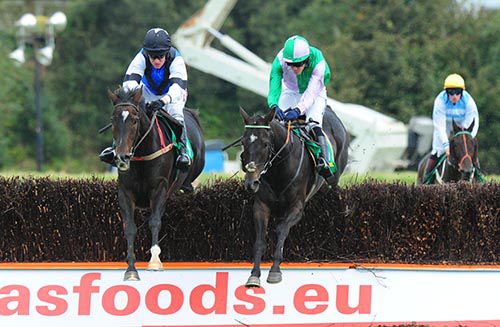 Blacklough, left, hits the front in Listowel