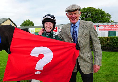 David Casey and Arthur Moore pictured with a rug sporting John Mulhern's colours