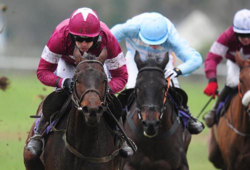 Aminabad and Ruby Walsh pictured on their way to victory with Doomsday Book back in second