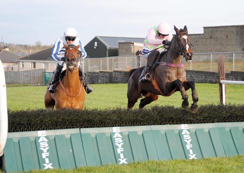Valyssa Monterg (right) and Ruby Walsh clear the last to beat Mystic Lass