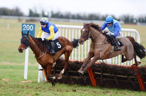 Fort Carson (left) tried in vain to fend off eventual winner, Hard Bought and Brian O'Connell (nearside)