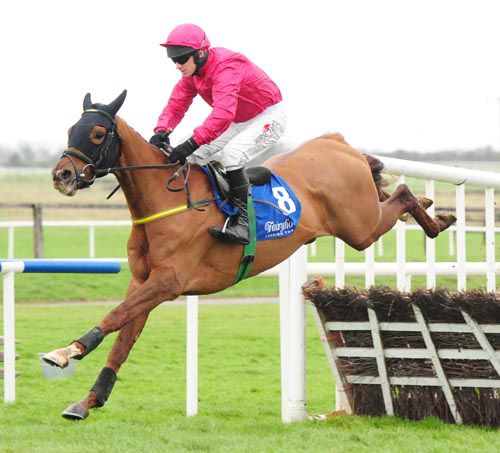 Officieux and Paul Carberry glide to victory