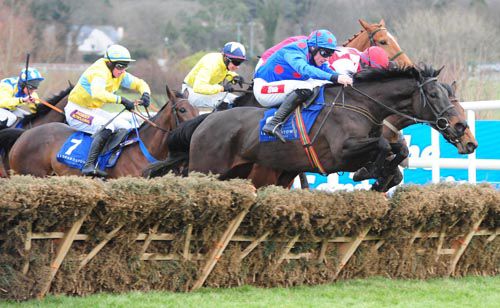 Golan Road (Davy Russell) jumps to the front at the last