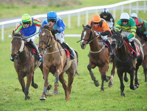 Hard Bought and Brian O'Connell (blue colours) leads them home in Gowran's third