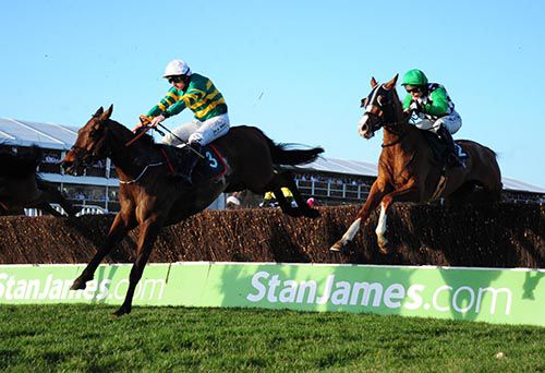 Cause Of Causes (Jamie Codd, white cap) jumps the last with Broadway Buffalo and Katie Walsh
